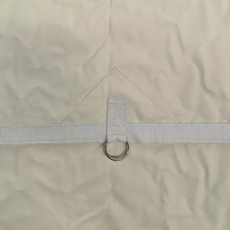 Storage tarpaulin/shade sail with metal rings
